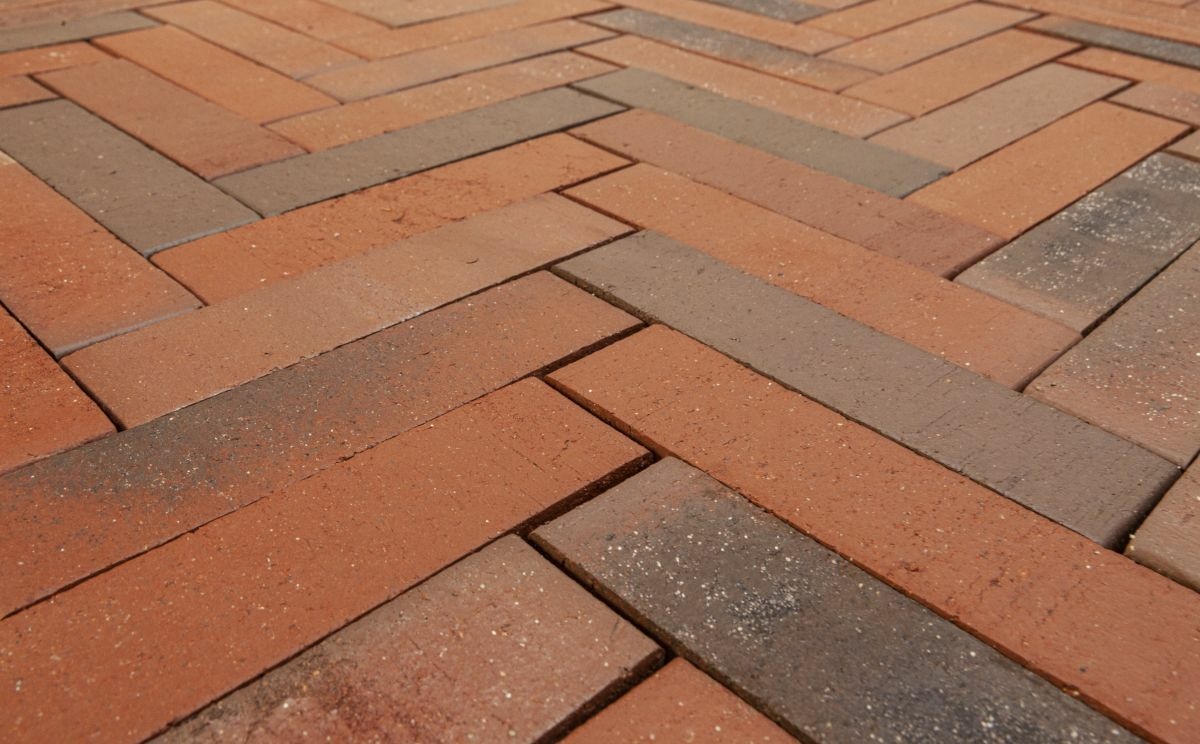 Red slim profile paver with coal burning